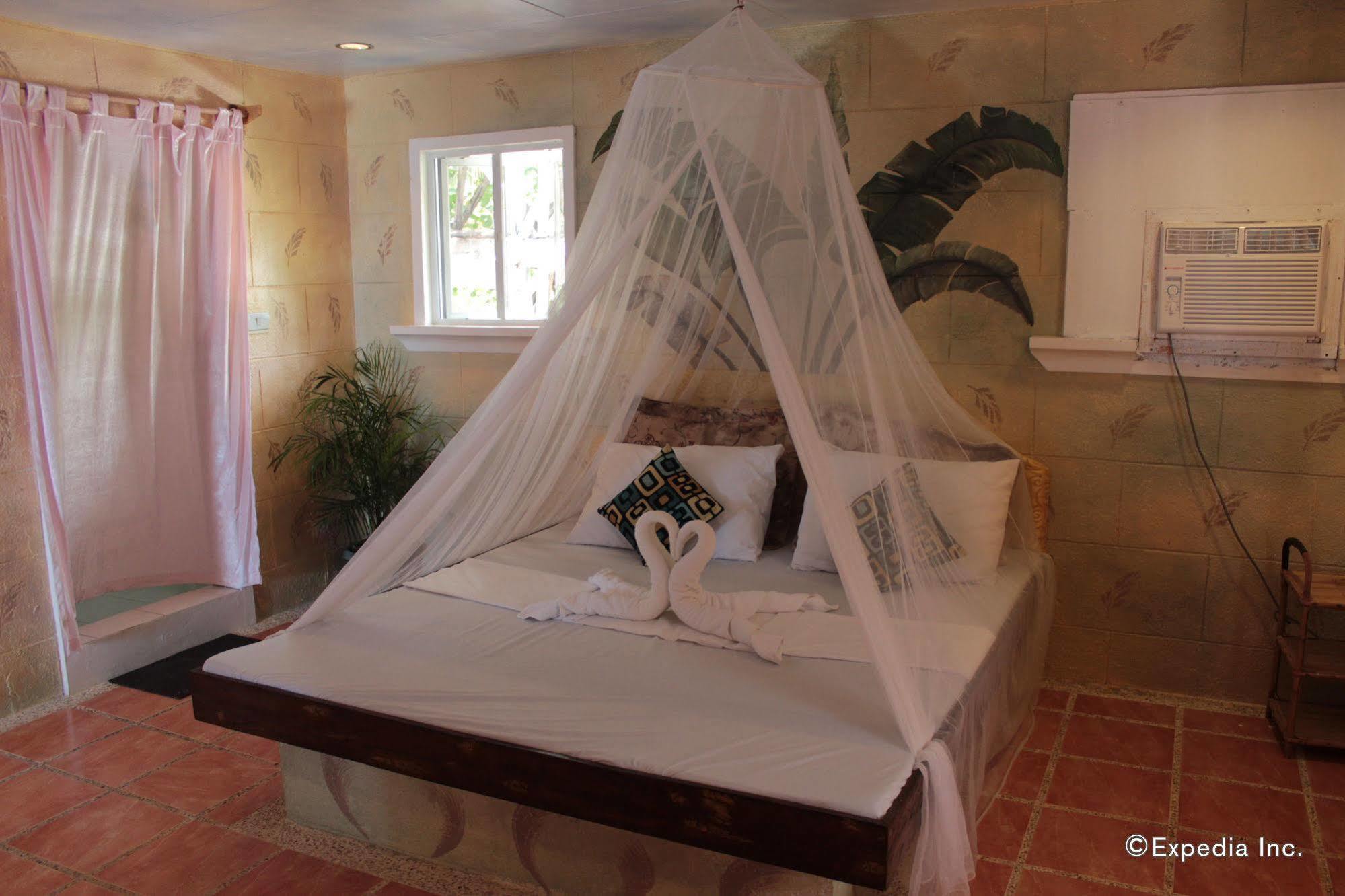 בוסואנגה Pierhouse Lodging מראה חיצוני תמונה