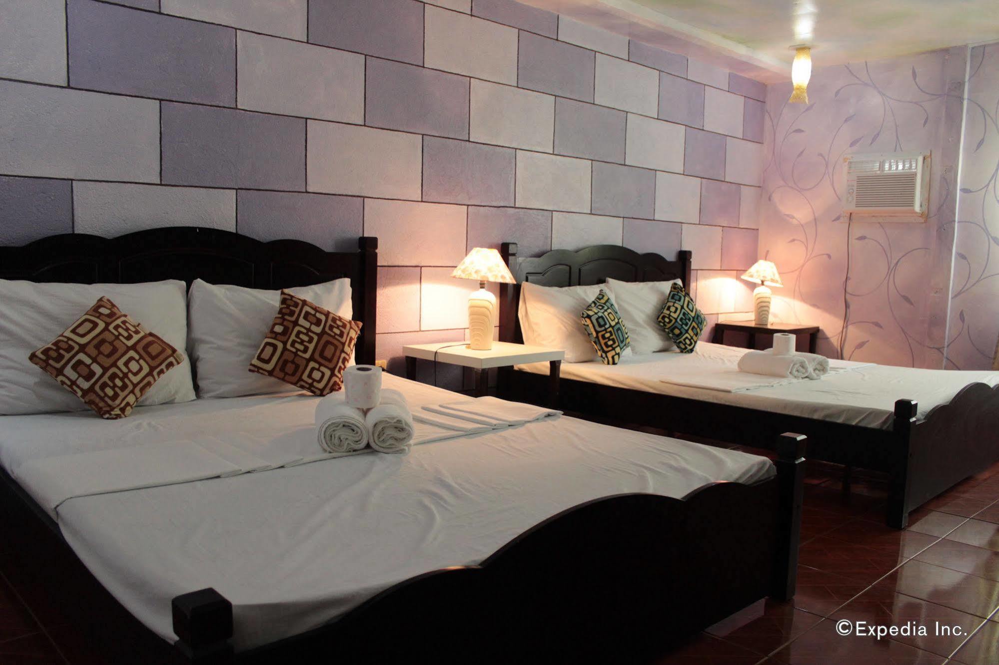 בוסואנגה Pierhouse Lodging מראה חיצוני תמונה